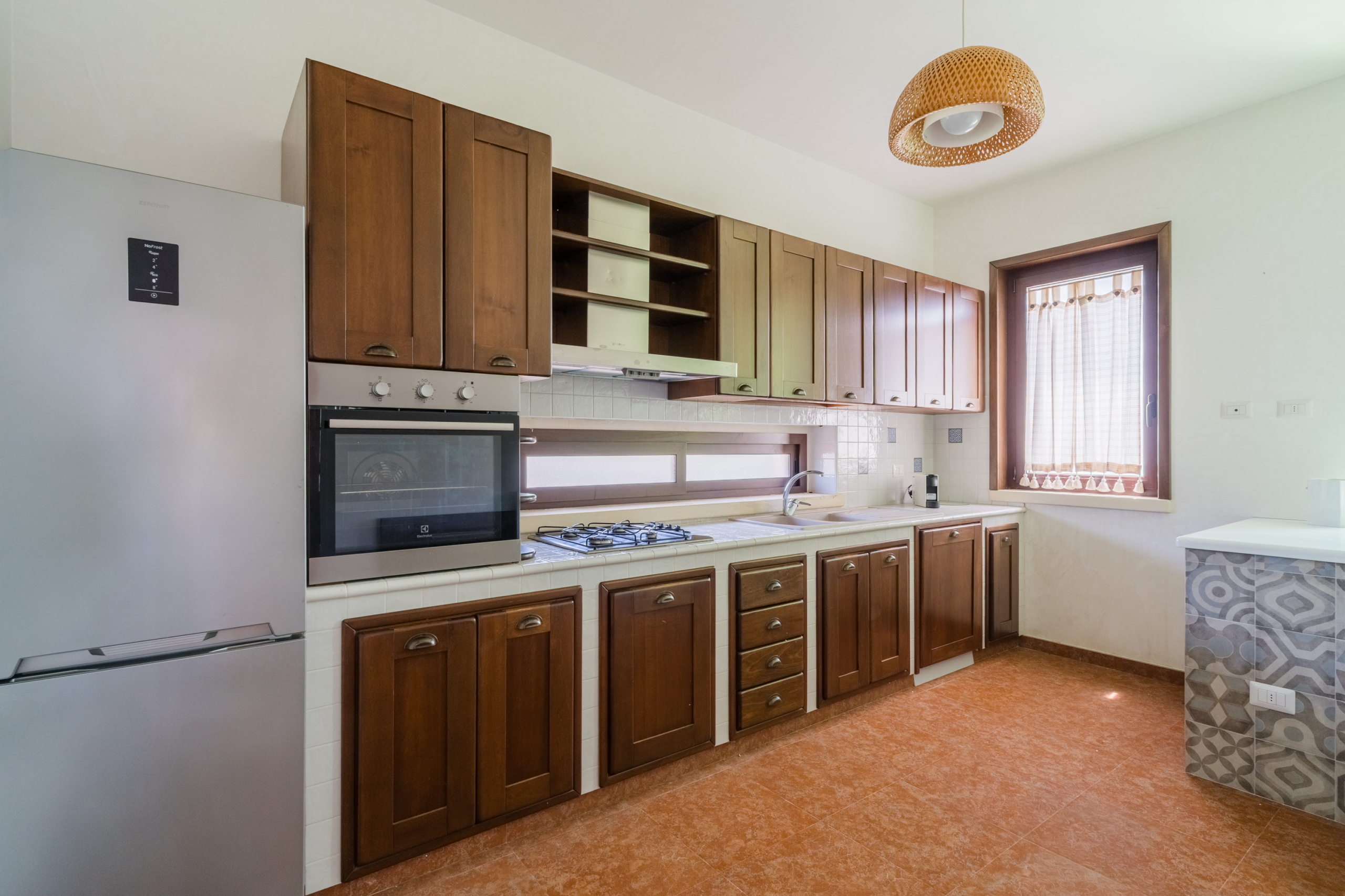 angolo cucina con frigo villa federico countryside